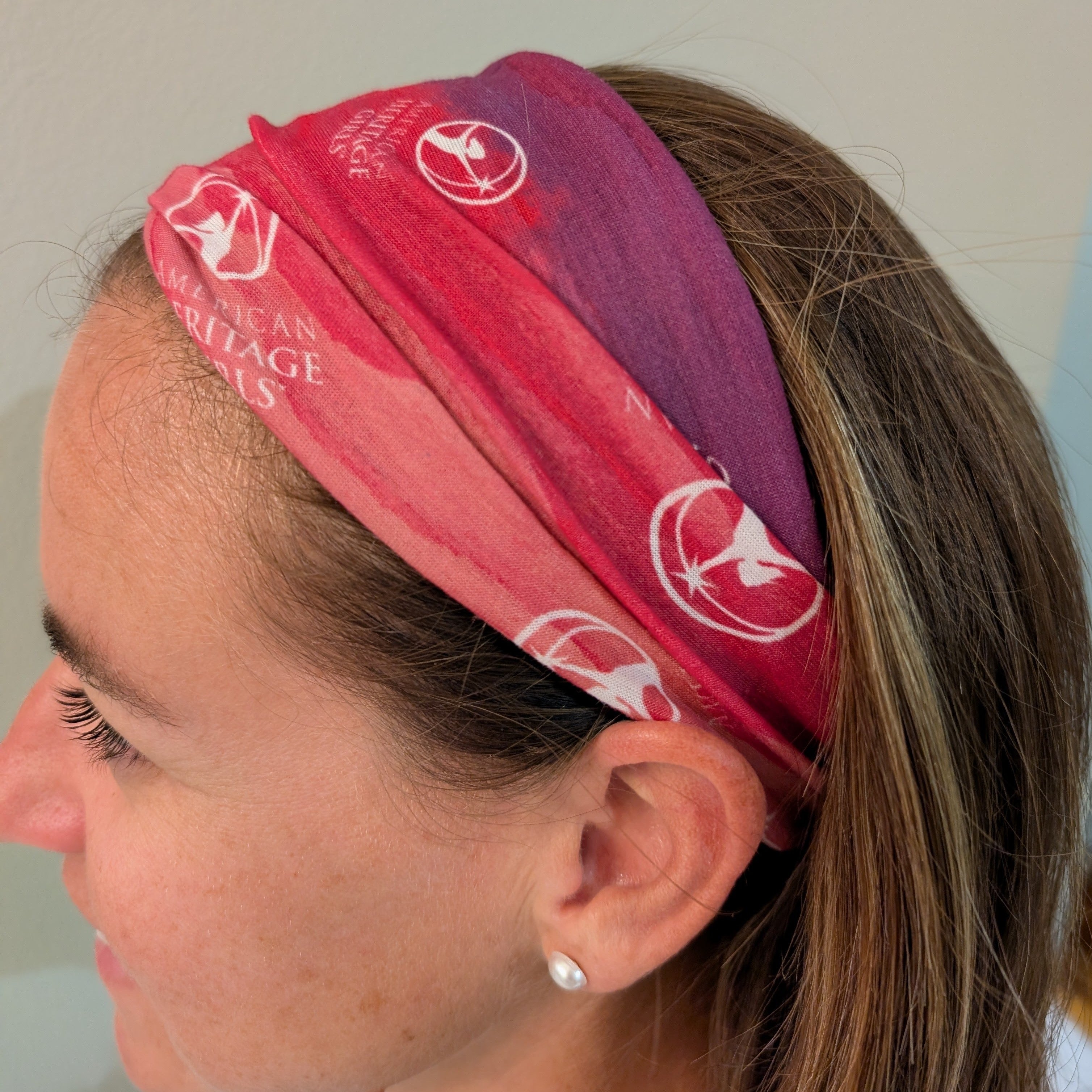 Person wearing a red and purple headband